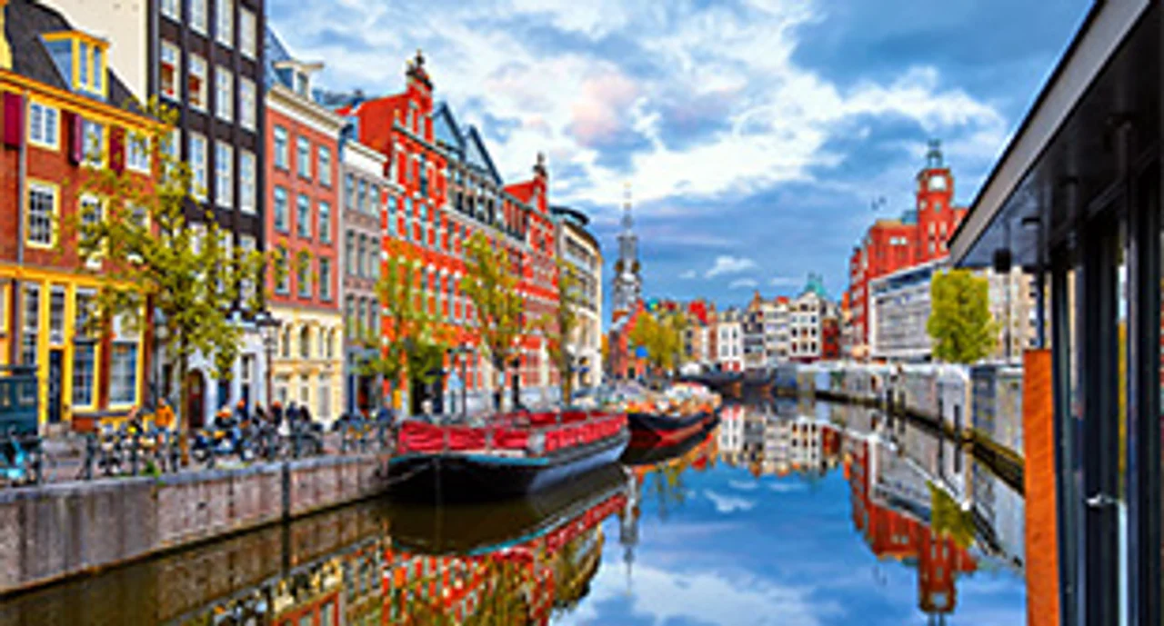 Amsterdam water way with buildings on both sides
